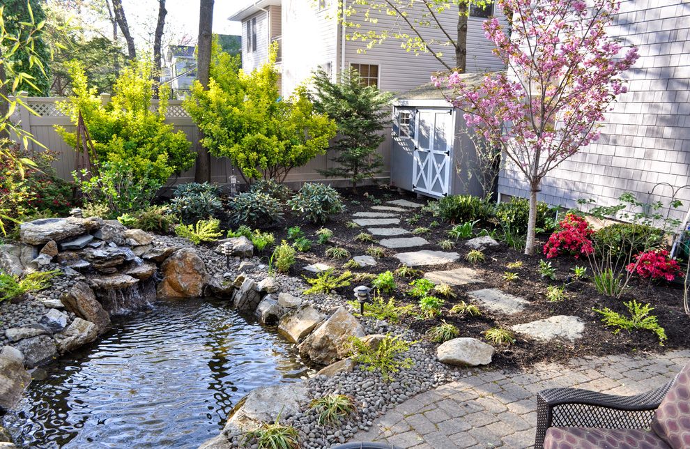 Backyard Koi Pond in Renton, Washington. Maintenance provided by Seattle Pond and Fountain