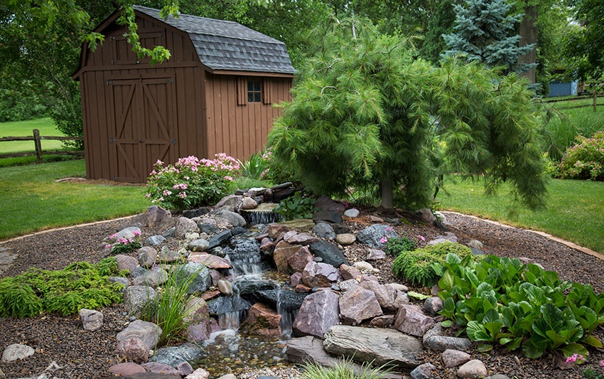 Beautiful water feature pond and fountain located in Hood River, Oregon. Monthly Maintenance provided by Portland Pond and Fountain